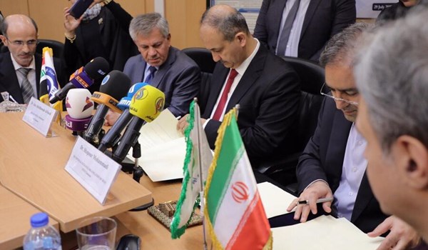 Iraq and Iran sign a memorandum of economic cooperation .. These are their objectives 122972019_13980507000674_Test_PhotoI